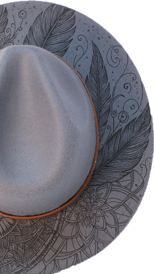 Close-up of engraved boho pattern and brown band