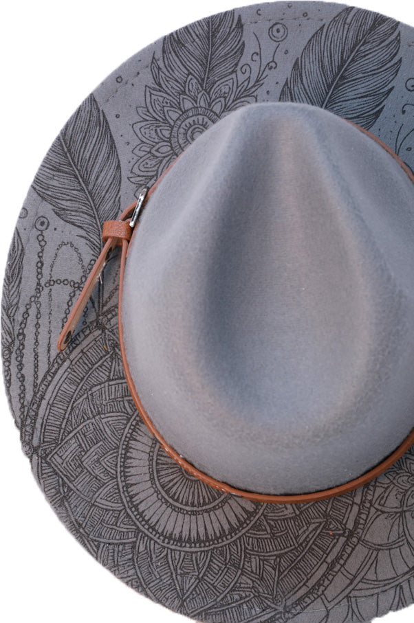 Side angle of grey Western hat showing engraved brim