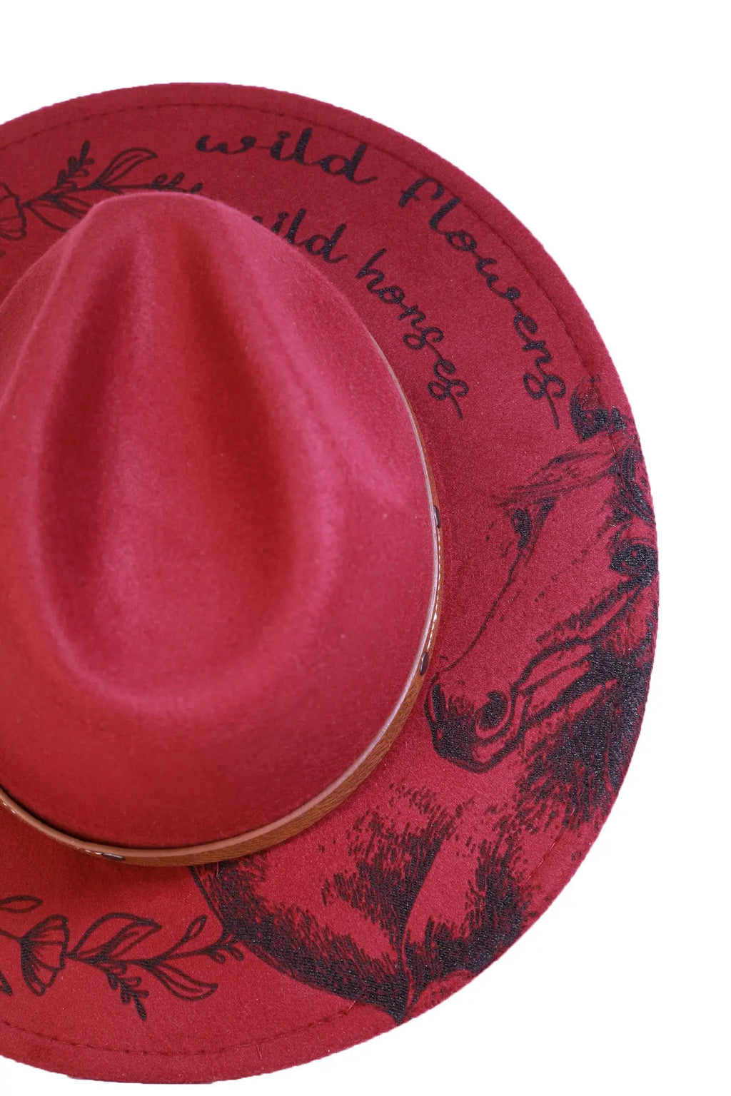 Side angle showing the floral engraving and brown faux-leather hat band