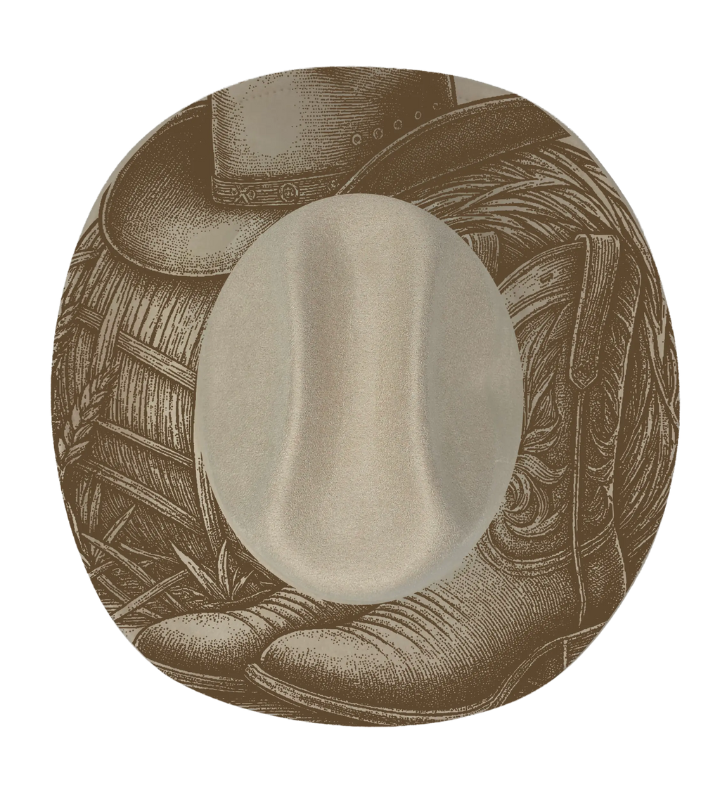 cream cattleman hat with cowboy hat, cowboy boots and saddle engraved onto the brim