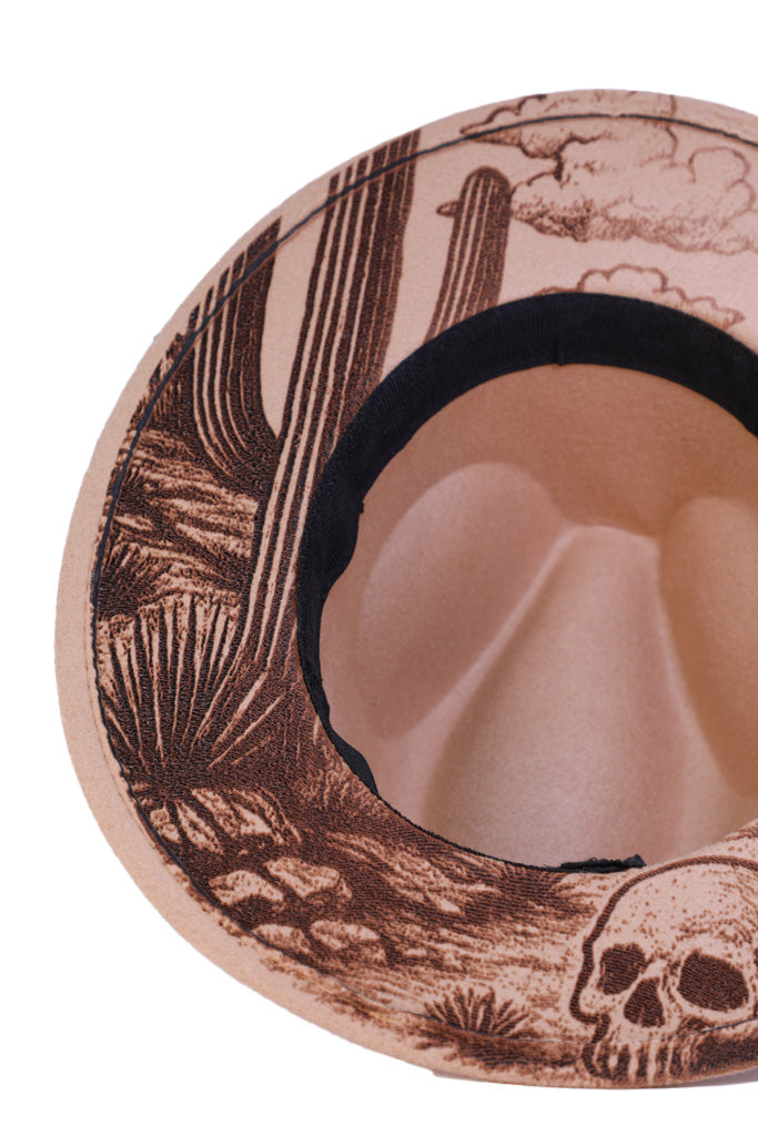 Engraved cactus and rocky desert texture on hat brim