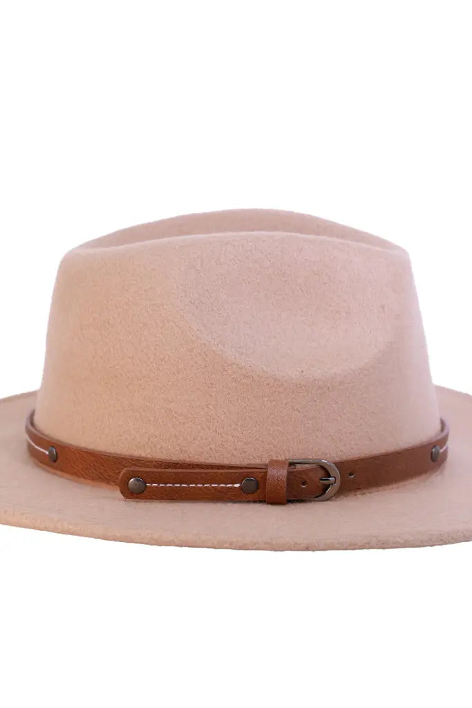 Side view of beige fedora showing engraved underside artwork