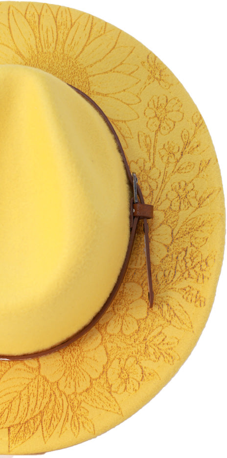 Floral engraved detail on yellow boho fedora hat brim