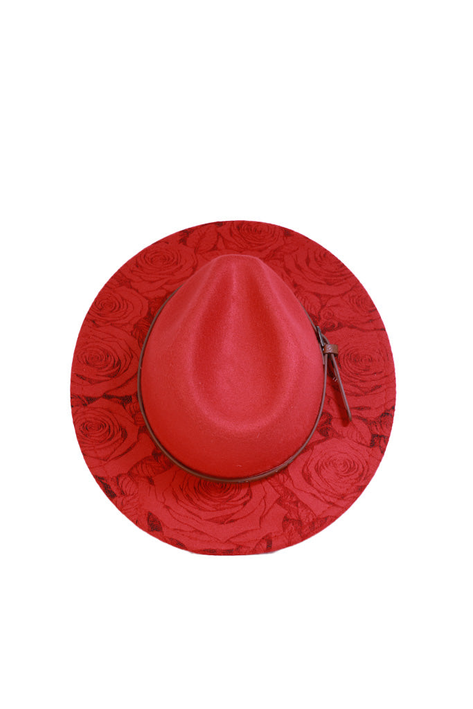 Red fedora hat with engraved rose pattern on brim