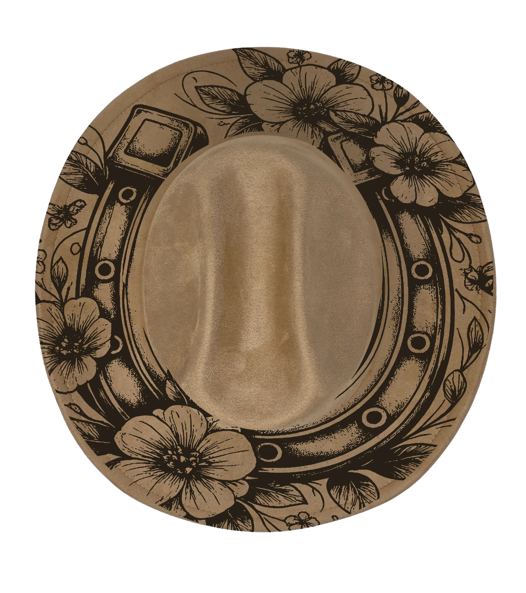 Tan coloured cattleman style hat with horse shoe and floral engraving