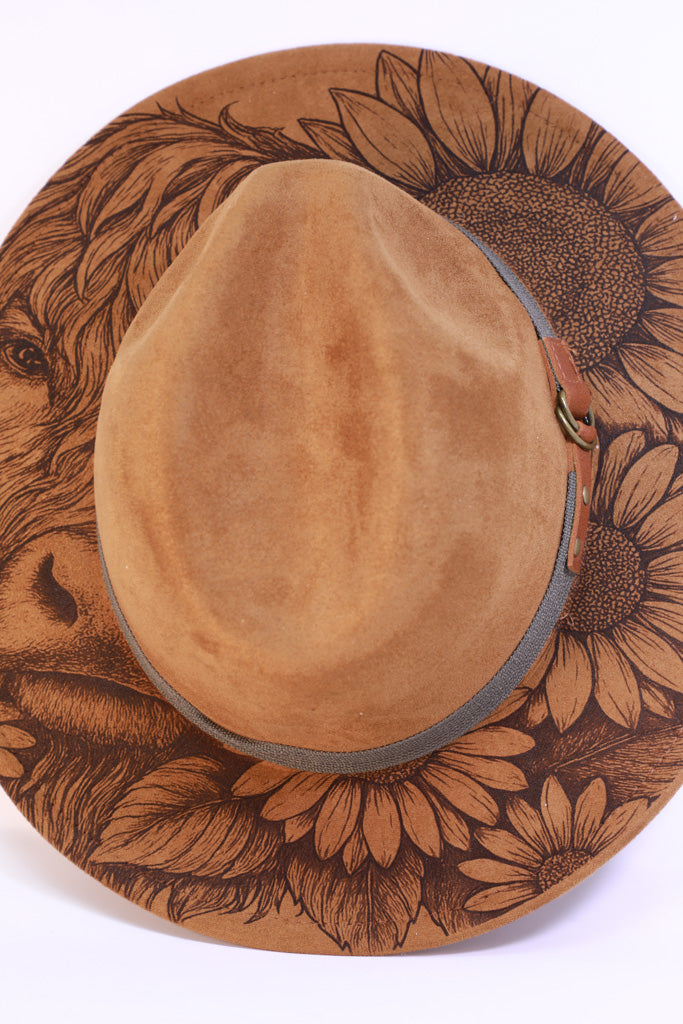 Laser engraved Highland cow and sunflower design on suede-effect fedora hat.
