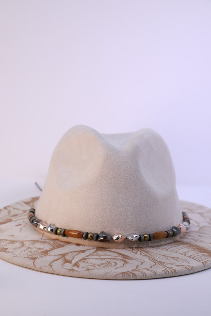 Western fedora with floral engraving and bead hatband