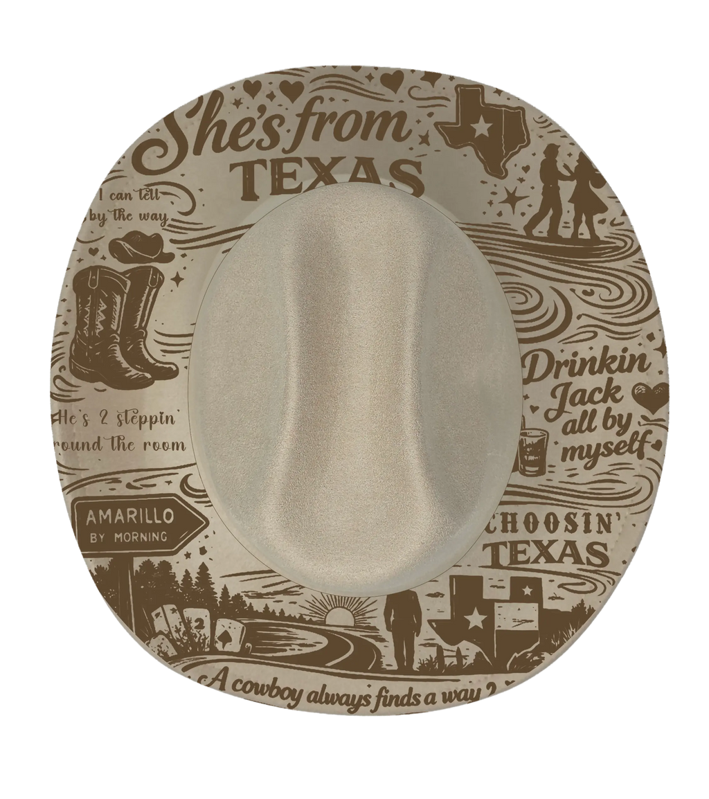 Biege cattleman hat with she's from texas graphic engraving