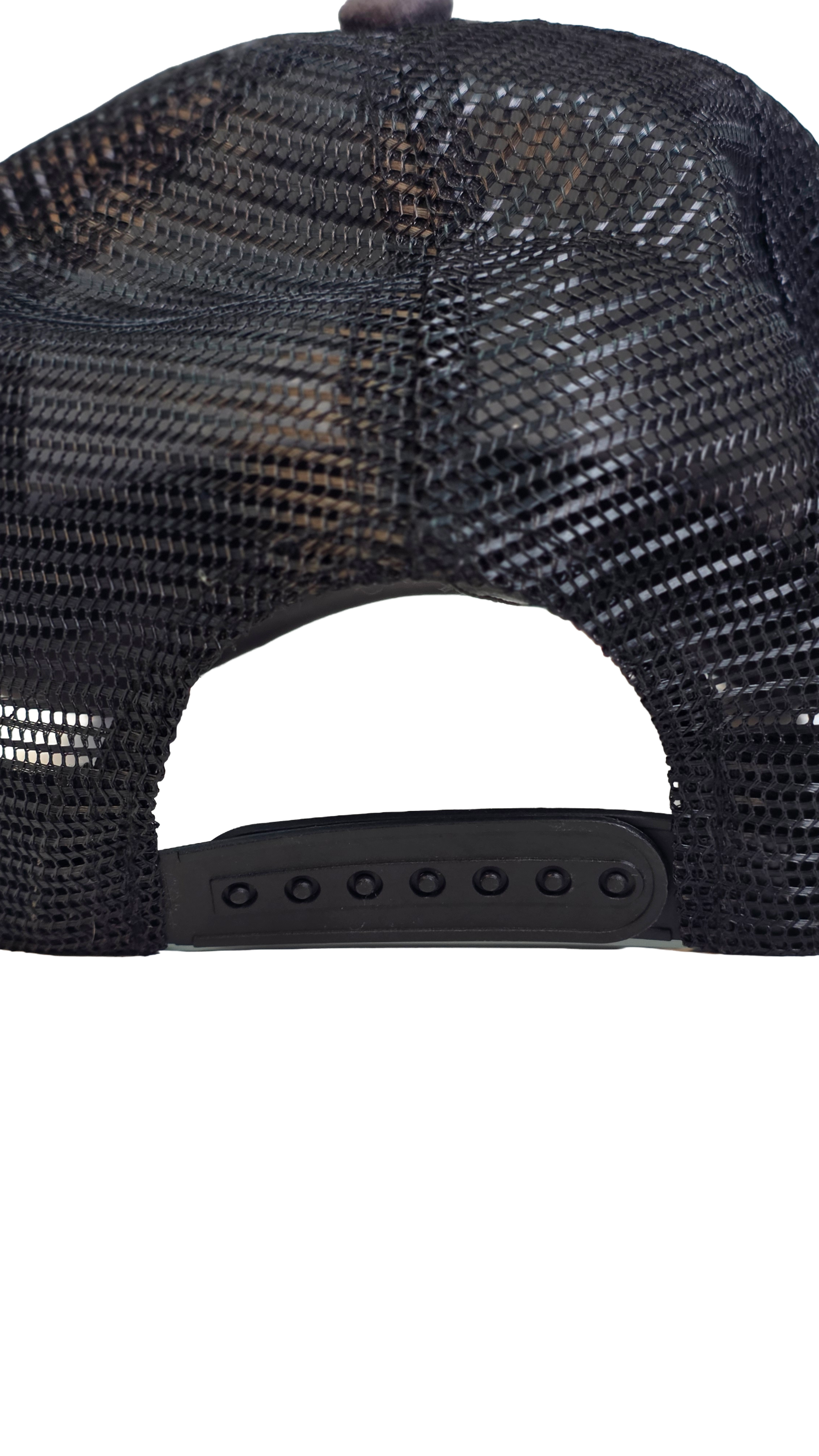 Adjustable black mesh snapback detail on country trucker hat