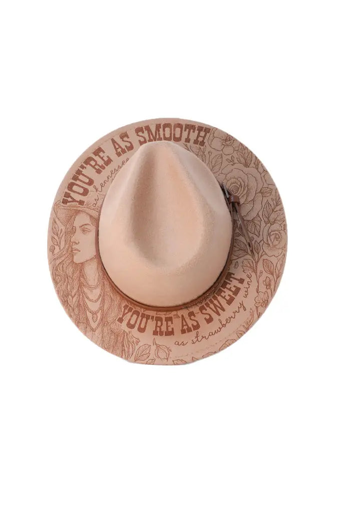 Beige fedora hat with Tennessee Whiskey lyric engraving