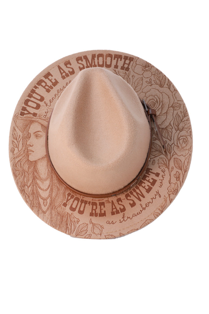Laser engraved cowgirl portrait and floral design on hat brim