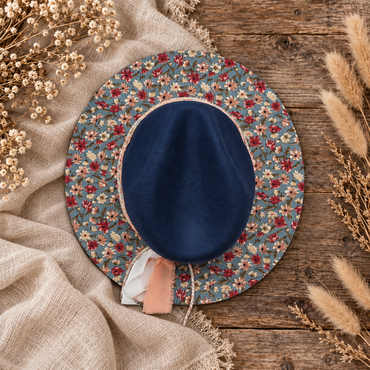 Floral Print Navy Fedora Hat Boho Style on a cream flat-lay background