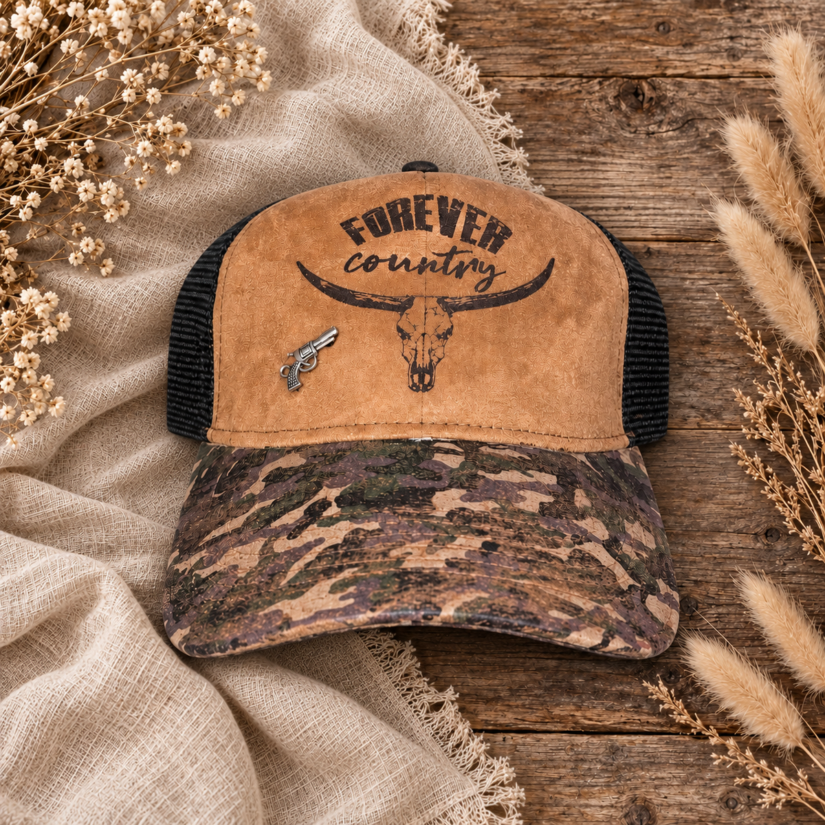 Forever Country Camo Trucker Hat on a cream flat-lay background