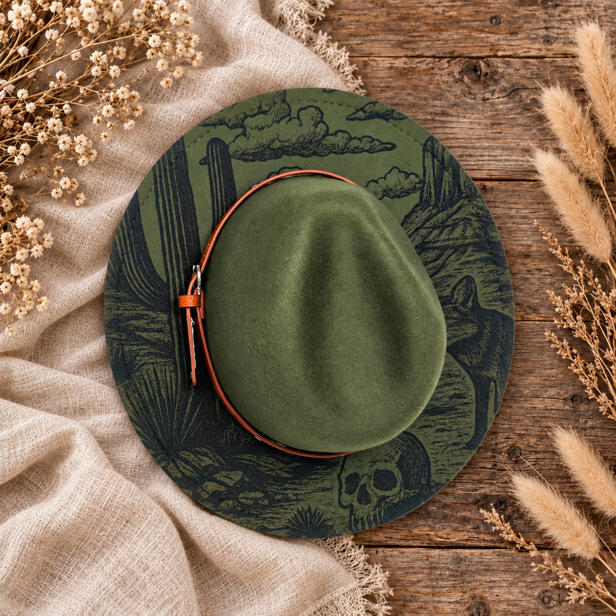 Green Desert & Skull Fedora Hat on a cream flat-lay background