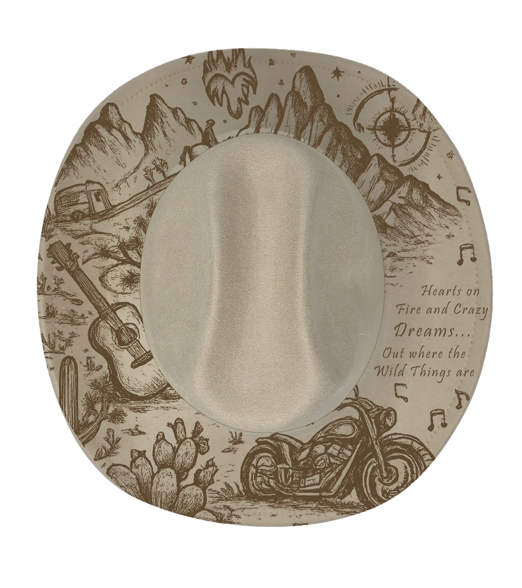 Biege cattleman with western desert theme engraved onto the brim