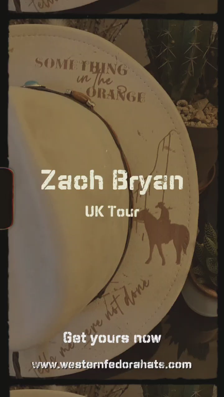 Something in the orange zach bryan hat