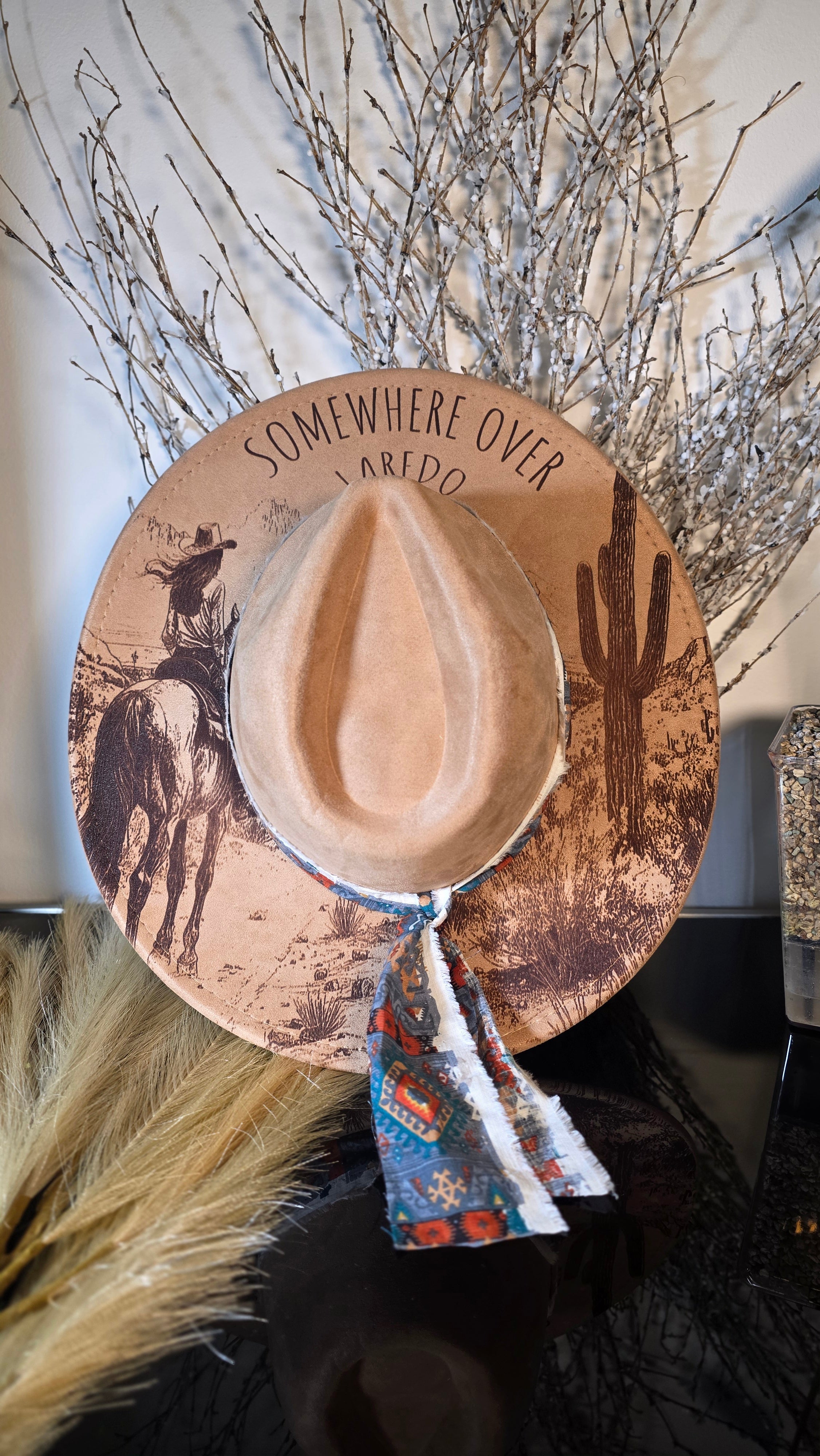 Beige western fedora with engraved desert landscape and scarf tie